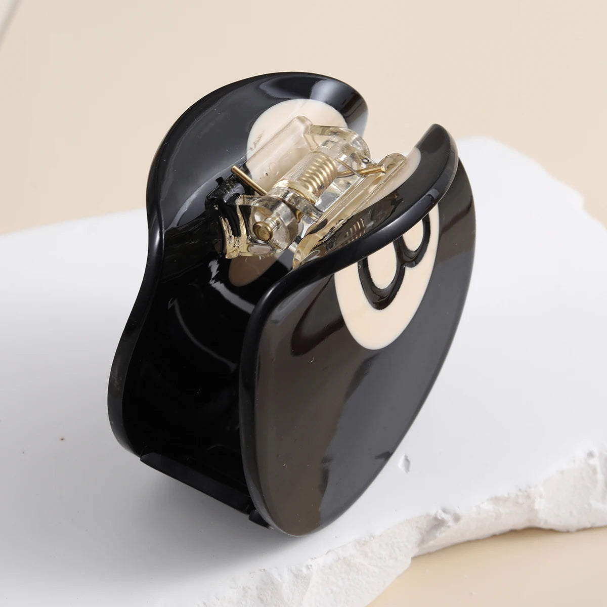 Pince à cheveux en forme de boule de billard